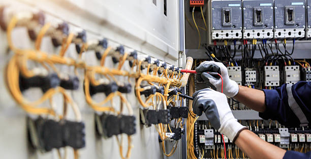 Professional Electrician technician working in Coopersville, MI